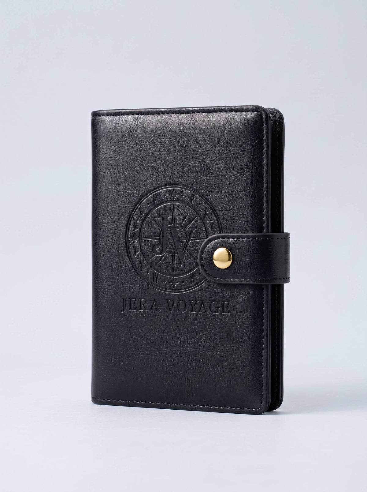The Voyager RFID Passport Wallet in black, front view with the debossed Jera Voyage seal